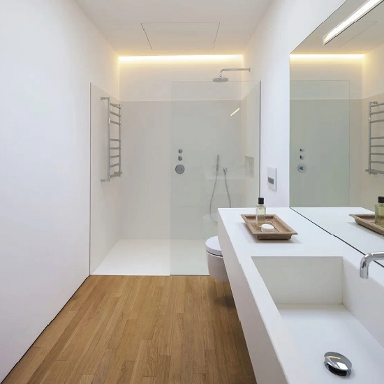 lavabo Neolith Just White en un baño moderno