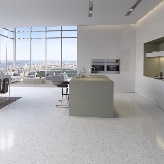 una cocina con encimera terrazo blanco Doge e isla